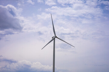 Wind Turbine Behind the beautiful blue sky
