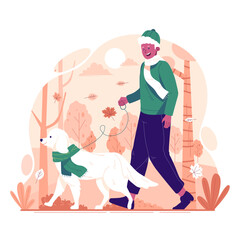 Obraz na płótnie Canvas Man walking with dog in park in autumn