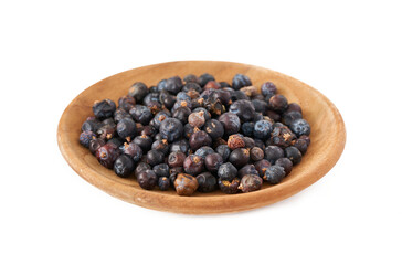 dry juniper berry seed in wood plate isolated on white background. pile of dry juniper berry seed isolated. heap of dry juniper berry seed                         
