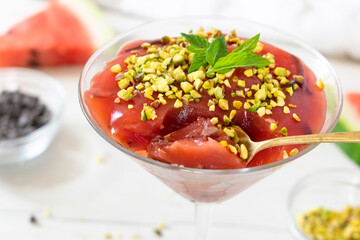 Traditional Sicilian Watermelon Pudding on a white background.