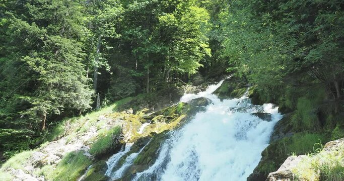 Lake Brienz in Switzerland. Destination of the shore hike between the Bay of Iseltwald and Giessbachbahn. Impressive Giessbach waterfall before brooking into the lake