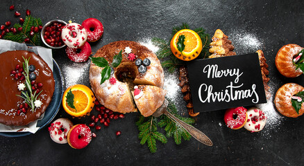 Christmas dessert table with  sweets and holiday decorations. Top view