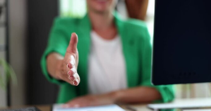 Confident friendly female business professional HR representative. Consultant manager extending hand for handshake and greeting