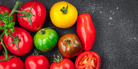 tomato assorted tomatoes different type red, yellow, green vegetable healthy meal food snack on the table copy space food background rustic top view