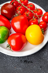 tomato assorted tomatoes different type red, yellow, green vegetable healthy meal food snack on the table copy space food background rustic top view
