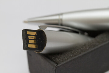 Macro shot of USB pen drive resting on a studio background. - 632044155