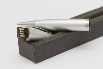 Macro shot of USB pen drive resting on a studio background. - 632044165