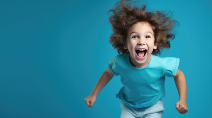 Little boy exited smiling on blue background. Created with Generative AI technology.