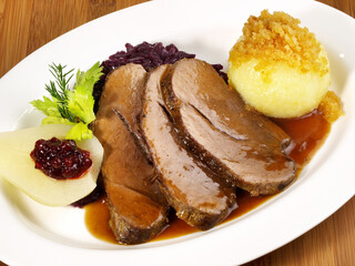 Wild Boar Roast with Potato Dumpling and red Cabbage