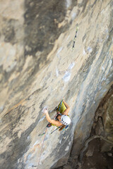 Women climbing in mountains, courage safety and determination