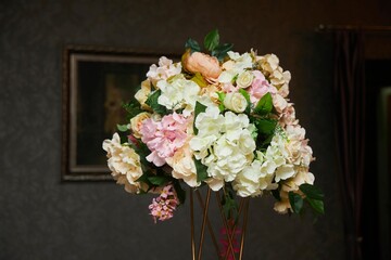 Flowers for decorating tables at a holiday. Floristry from professional decorators.