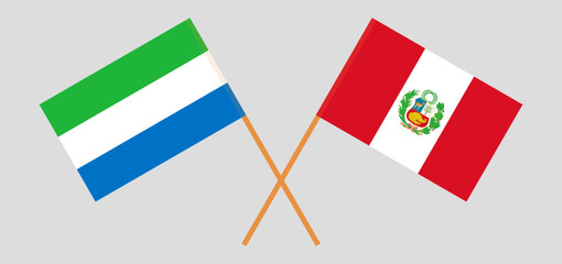 Crossed flags of Sierra Leone and Peru. Official colors. Correct proportion