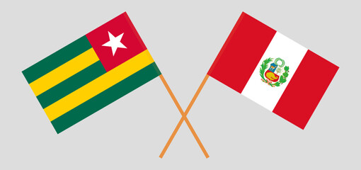 Crossed flags of Togo and Peru. Official colors. Correct proportion