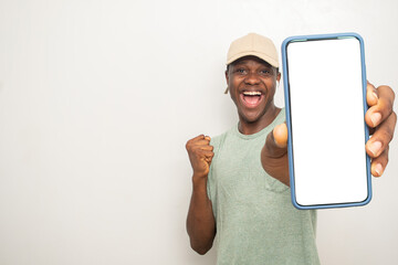yong black man showing his phone screen rejoices