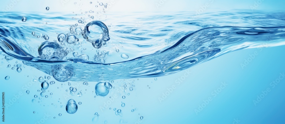 Poster The water panoramic banner background is a flat lay image of water texture with rings and ripples. It is a spa concept background with copy space for composition.
