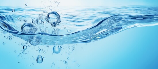 The water panoramic banner background is a flat lay image of water texture with rings and ripples....