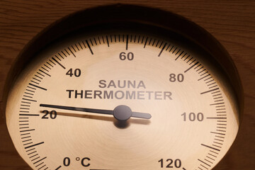 Sauna thermometer made of wood closeup