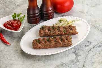Kebab with beef served onion