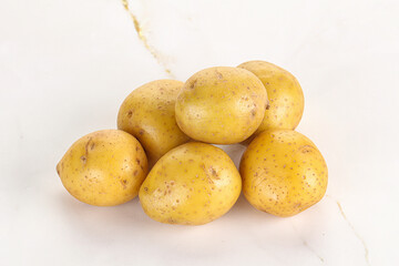 Raw young baby potato heap