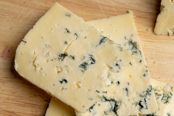 Cheese with blue mold cut into pieces