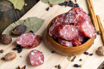 Dried pork sausage during slicing