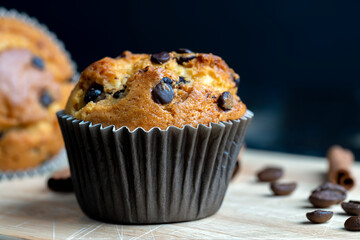 Cupcake with chocolate pieces, close up