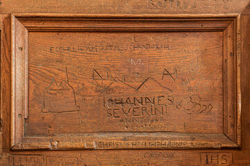 graffiti on old choir chairs in Sorø Abbey Church