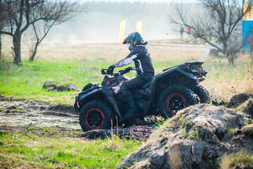 Fototapeta premium ATV, UTV, buggy, 4x4 off-road vehicle in mud and dust. Extreme, adrenalin