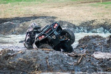 ATV, UTV, buggy, 4x4 off-road vehicle in muddy water. Extreme, adrenalin © Antonio