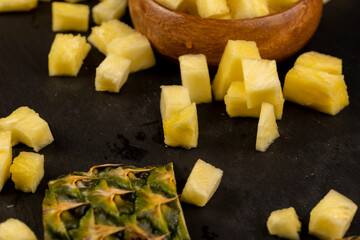 sliced ripe yellow pineapple, a large number of pieces