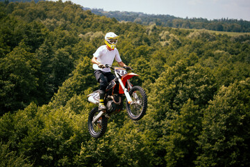 Extreme free ride motocross in fields.