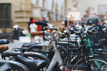 Parked bicycles on a historic European street. City lifestyle and tranportation.