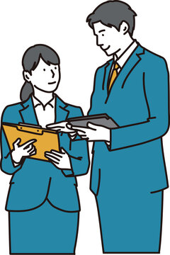 部下に仕事を教える上司のビジネスマン