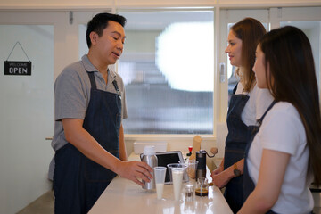 Entrepreneur and team work at coffee café. Small business and entrepreneur concept.