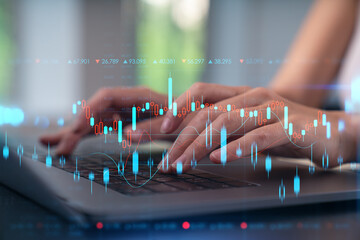 Woman typing on laptop at office workplace in background. Concept of working process, internet surfing, online business education. Student send e-mail. Close up view. forex graph and charts