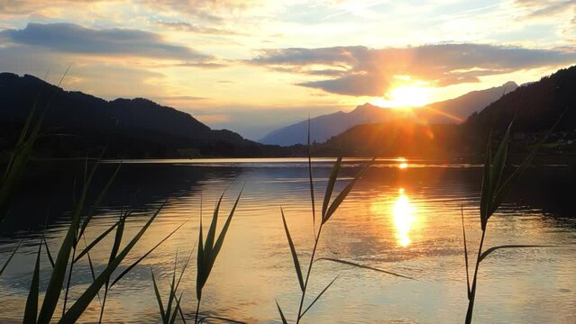 Picturesque sunset on the Weissensee mountain lake
