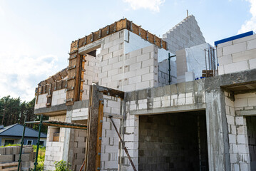 Fototapeta premium Wooden formwork made of shuttering boards of the gable wall rim and lintels.