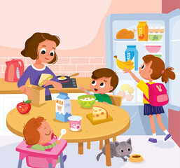 Family having breakfast in the kitchen. Mom with children. Healthy food. Eating healthy.