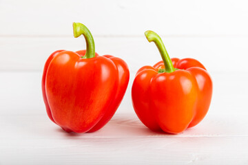 PAPRIKA.Fresh whole red bell pepper on a light textured background. Bulgarian salad pepper .Fresh vegetables. Harvest. Vegan. close up
