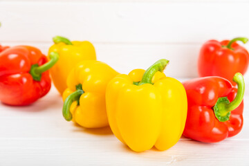 PAPRIKA.Fresh yellow and red bell pepper isolated on white background. Bulgarian salad pepper .Fresh vegetables. Harvest. Vegan. closeup. Place for text. copy space.