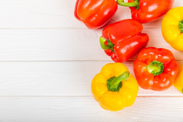 PAPRIKA.Fresh yellow and red bell pepper isolated on white background. Bulgarian salad pepper .Fresh vegetables. Harvest. Vegan. closeup. Place for text. copy space.