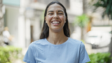 African american woman smiling confident standing at street