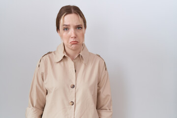 Young caucasian woman wearing casual shirt depressed and worry for distress, crying angry and afraid. sad expression.