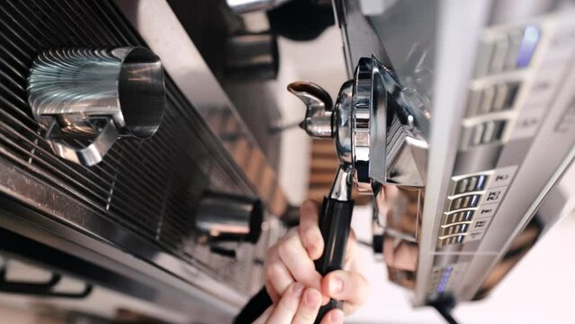 Stages of making coffee. Coffee machine. Barista at work