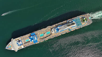 Sailing cruise ship aerial top view