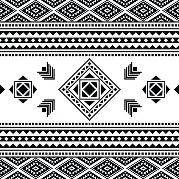 Seamless tribal pattern with geometric shapes in black and white colors. Aztec ethnic background design for fabric print and decoration.