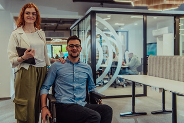 Young business colleagues, collaborative business colleagues, including a person in a wheelchair,...