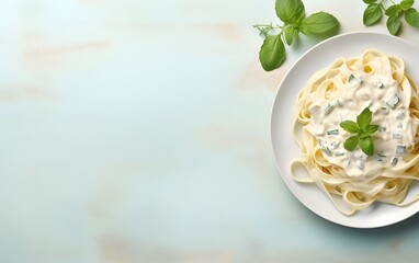 Pasta fettuccine alfredo with basil and fried chicken ham in creamy cheese sauce on a light stone, marble, modern pastel background, copyspace AI Generated 