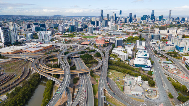 Aerial drone view of the Bowens Hill Interchange in Bowen Hills, Brisbane, Queensland Australia showing Brisbane City cbd in the background 