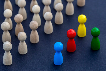 To be different, to be a leader, to lead. icon expression with colorful wooden figures. Teamwork concept, Wooden Stick Figures team. Teamwork concept, Wooden Stick Figures team.